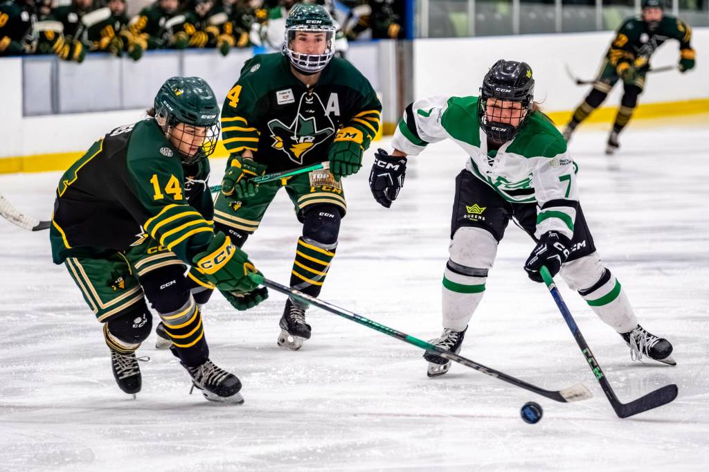 RDP Queens forward Natalie Tychkowsky battles for a loose puck in Game 2 of the ACAC Final at the Gary W. Harris Canada Games Centre on Saturday night. The Queens won 2-1 in overtime and hold a 2-0 series lead in the best-of-five final. (Photo by RDP Athletics/Flickr)